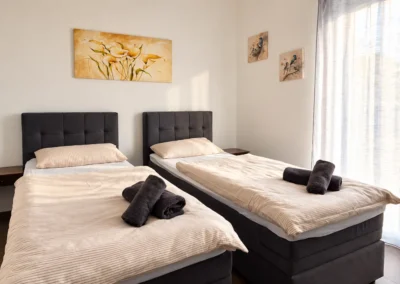 Deluxe Apartments - Schlafzimmer